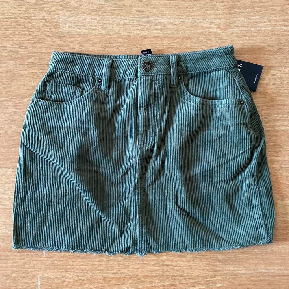 Green corduroy mini skirt